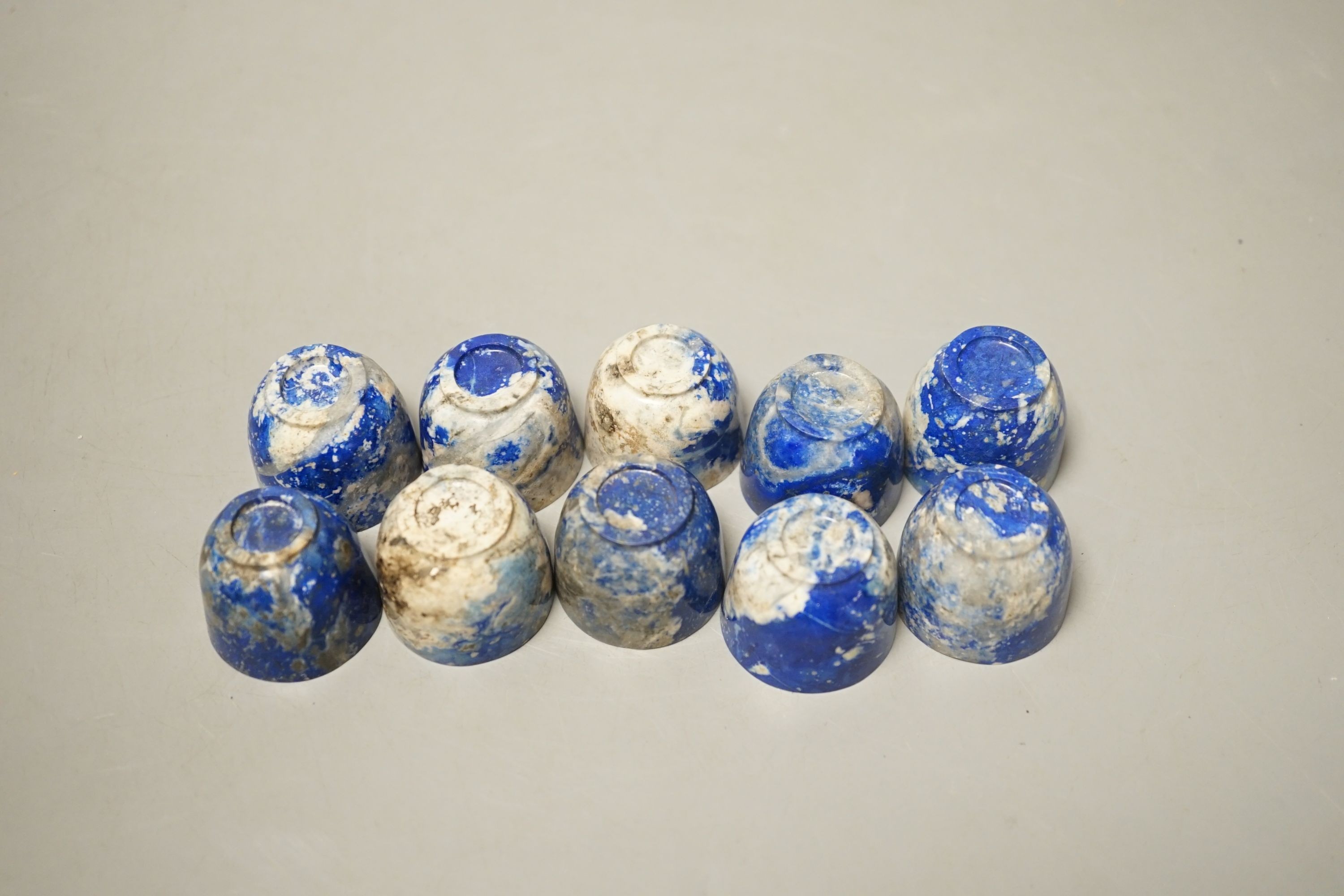 A set of ten Chinese lapis lazuli cups, 2.5cm tall